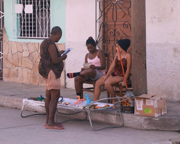 Women Selling On City Street Market