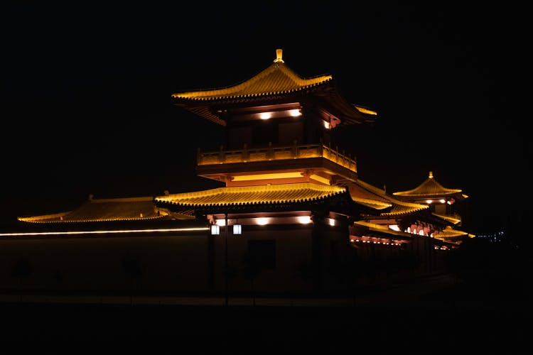 Illuminated Traditional Building At Night