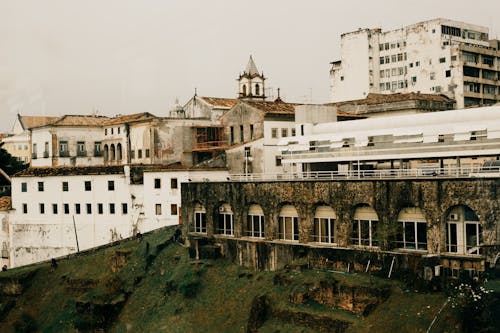 White Concrete Building under Gloomy Sky