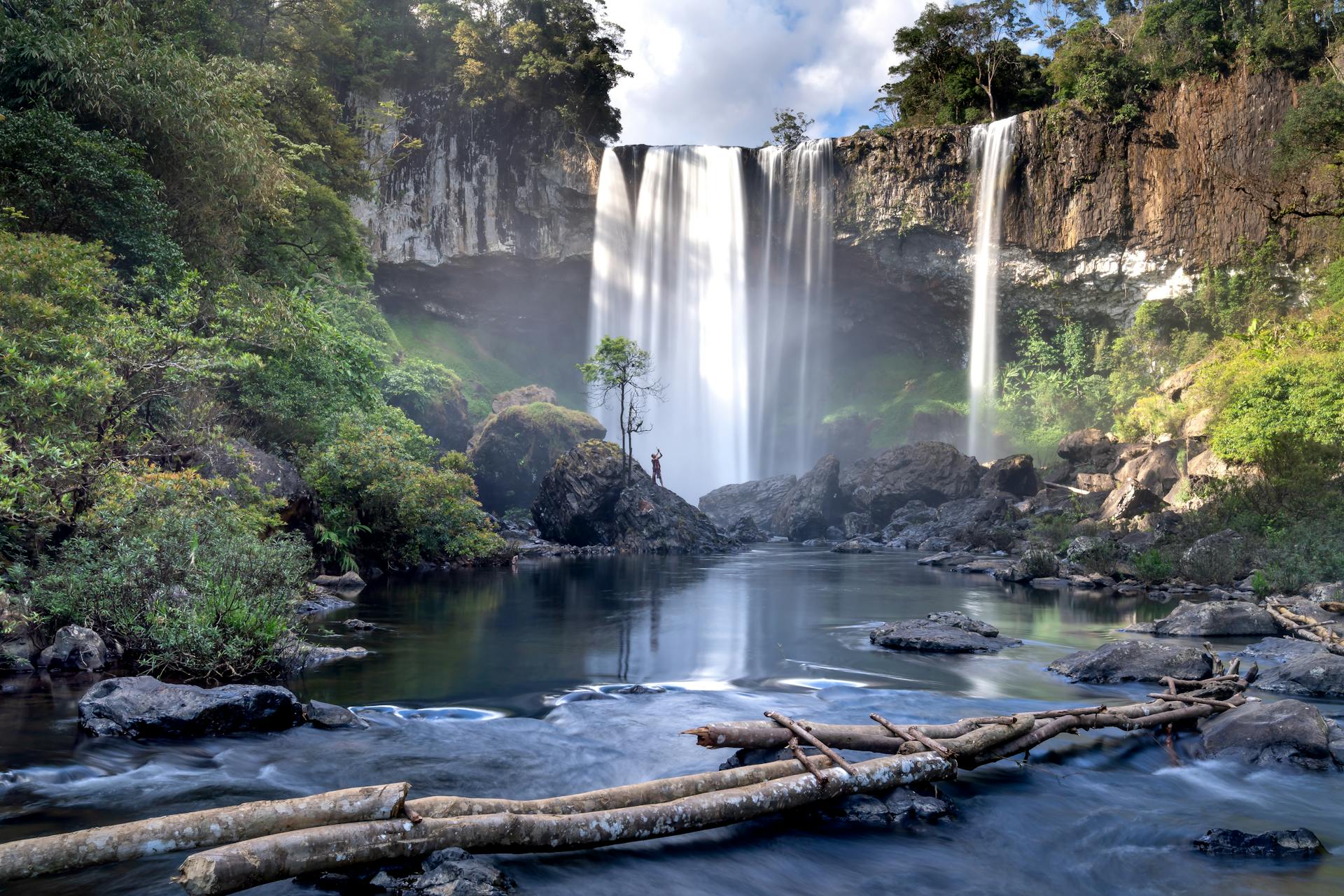 Explore the stunning beauty of Kon Chu Rang waterfall surrounded by lush greenery in Vietnam.