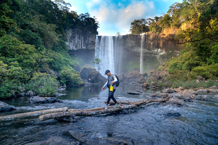 A Man Crossing A River 