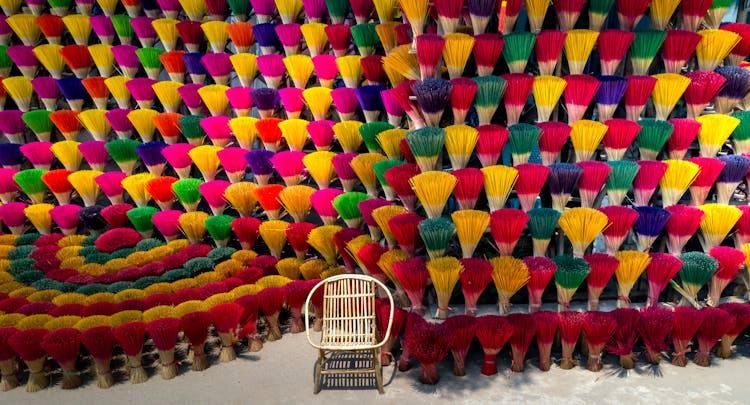 Colorful Incenses And A Chair 