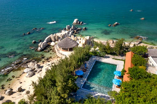 Aerial View of Swimming Pool Sea and Coastline