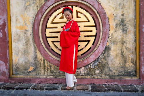 Kostenloses Stock Foto zu ao dai, architektur, asiatische frau