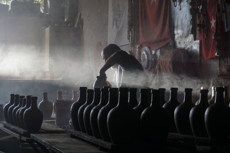 Man With Handmade Pots 