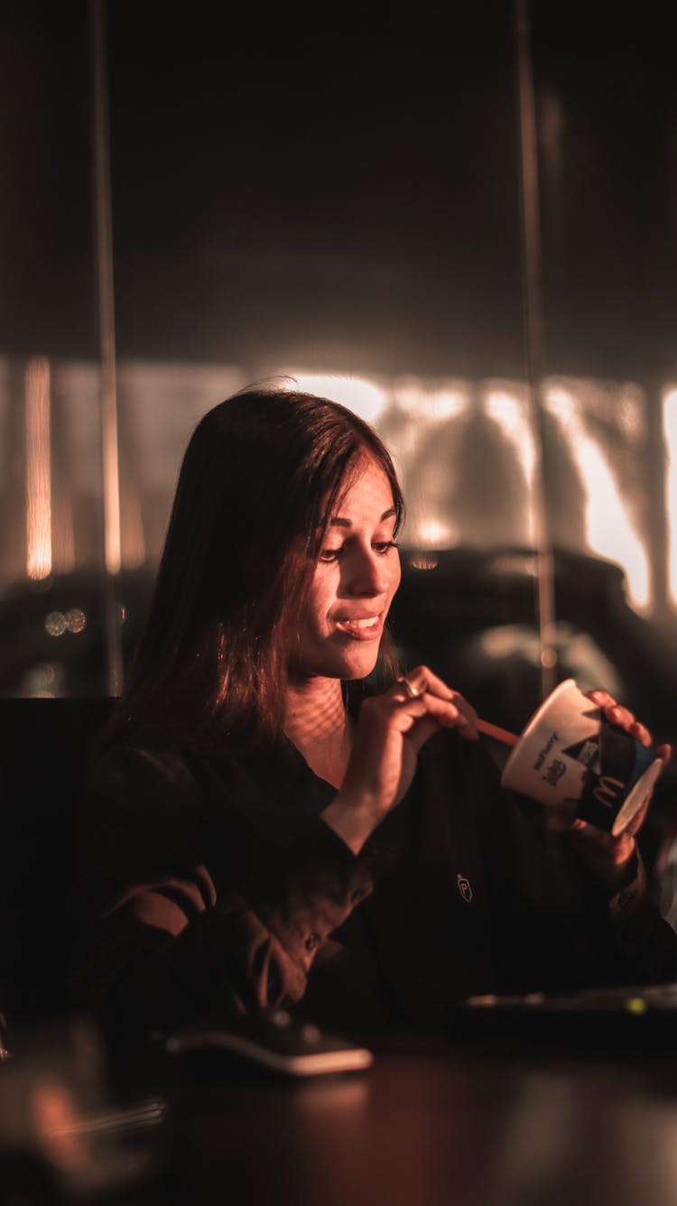 A Woman Eating Fast Food