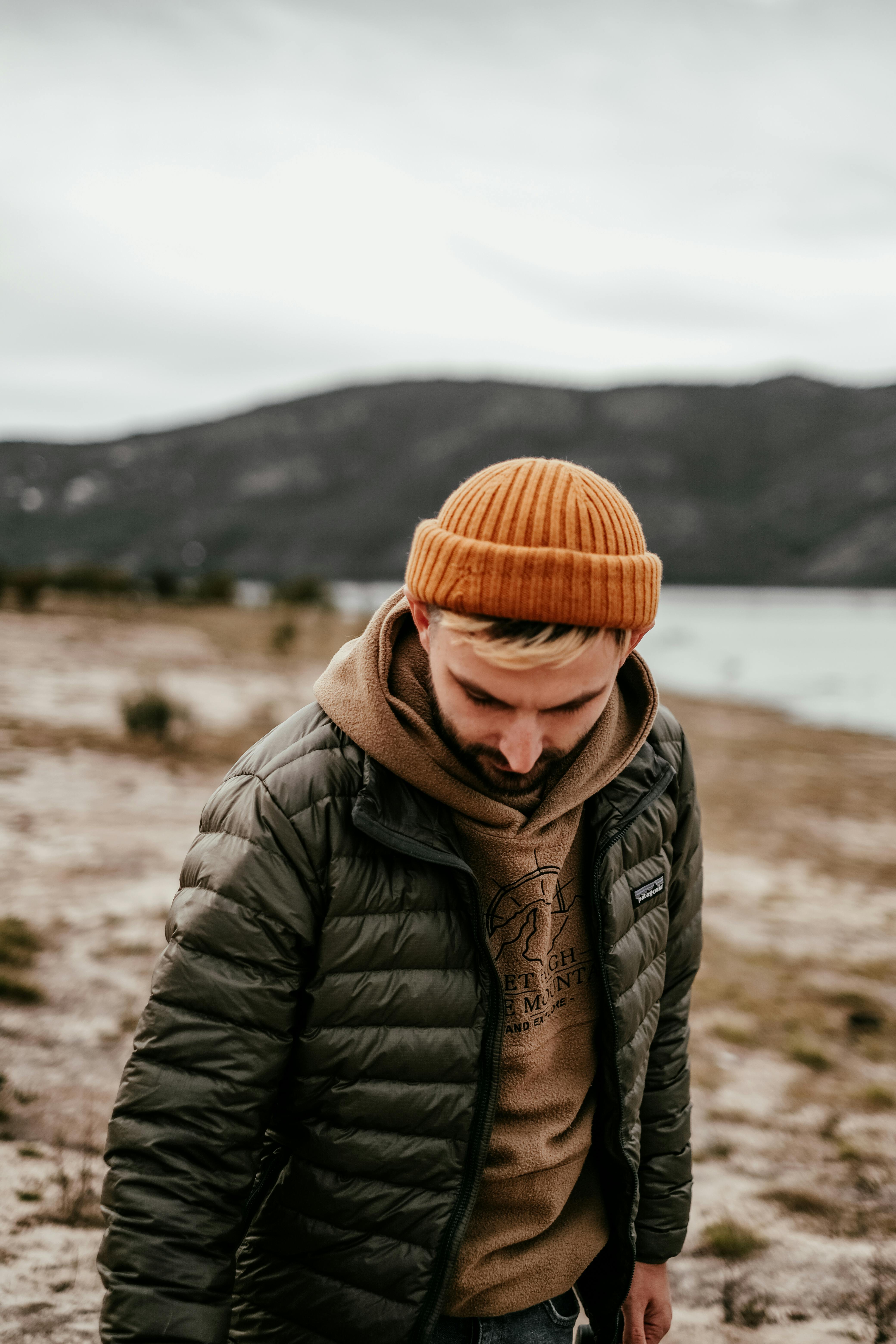 Stylish man in beanie and jacket on a cold day outdoors in Melbourne, Australia.