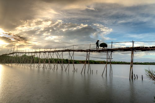 Wooden Bridge over a River