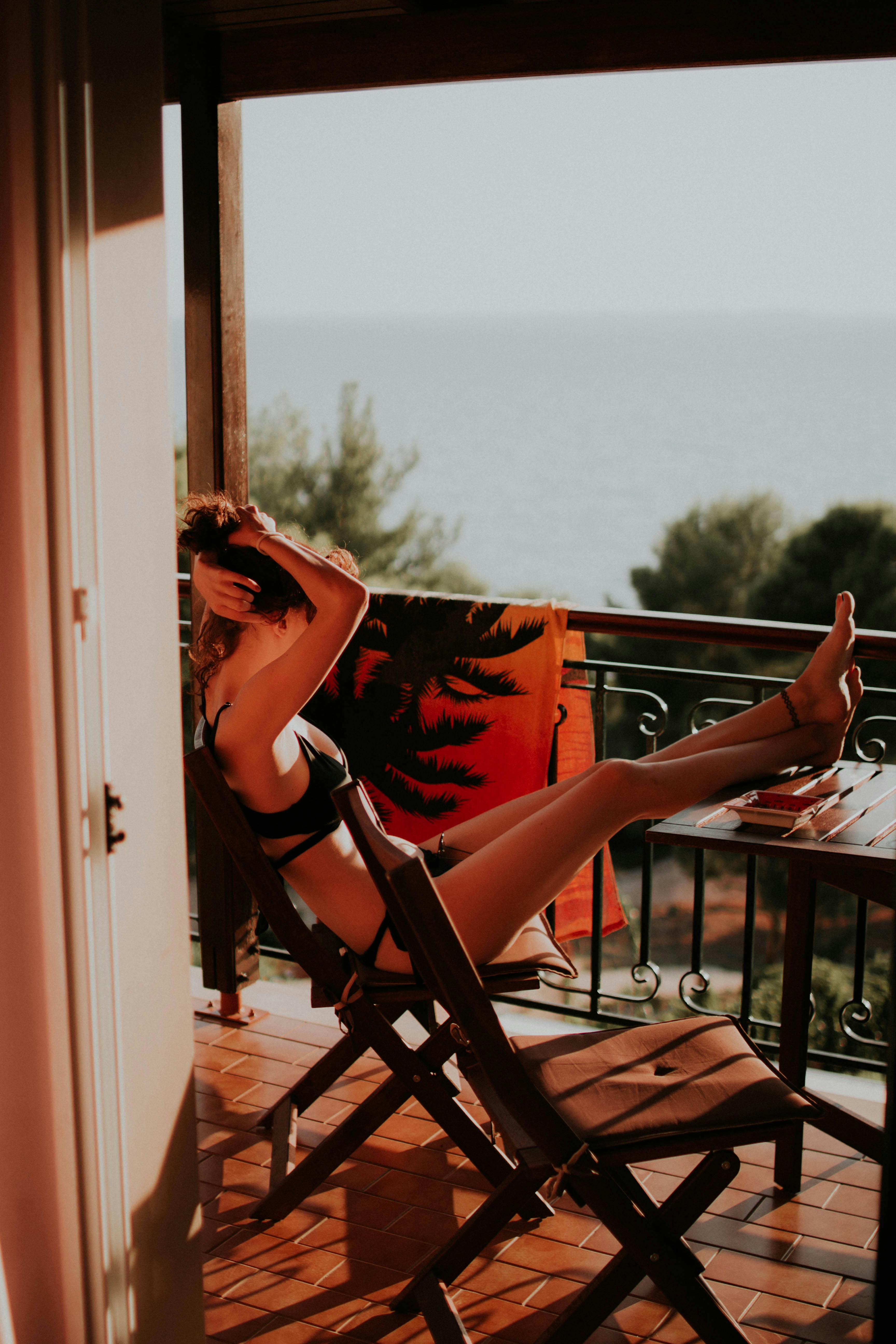 Woman Sitting On Chair With Feet On The Table · Free Stock ...