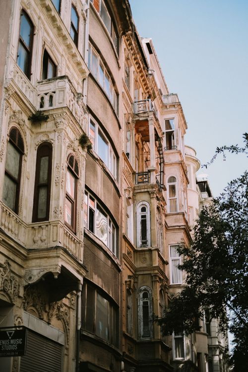 Free Low angle view of historic buildings in Beyoglu, Istanbul showcasing classic architecture. Stock Photo