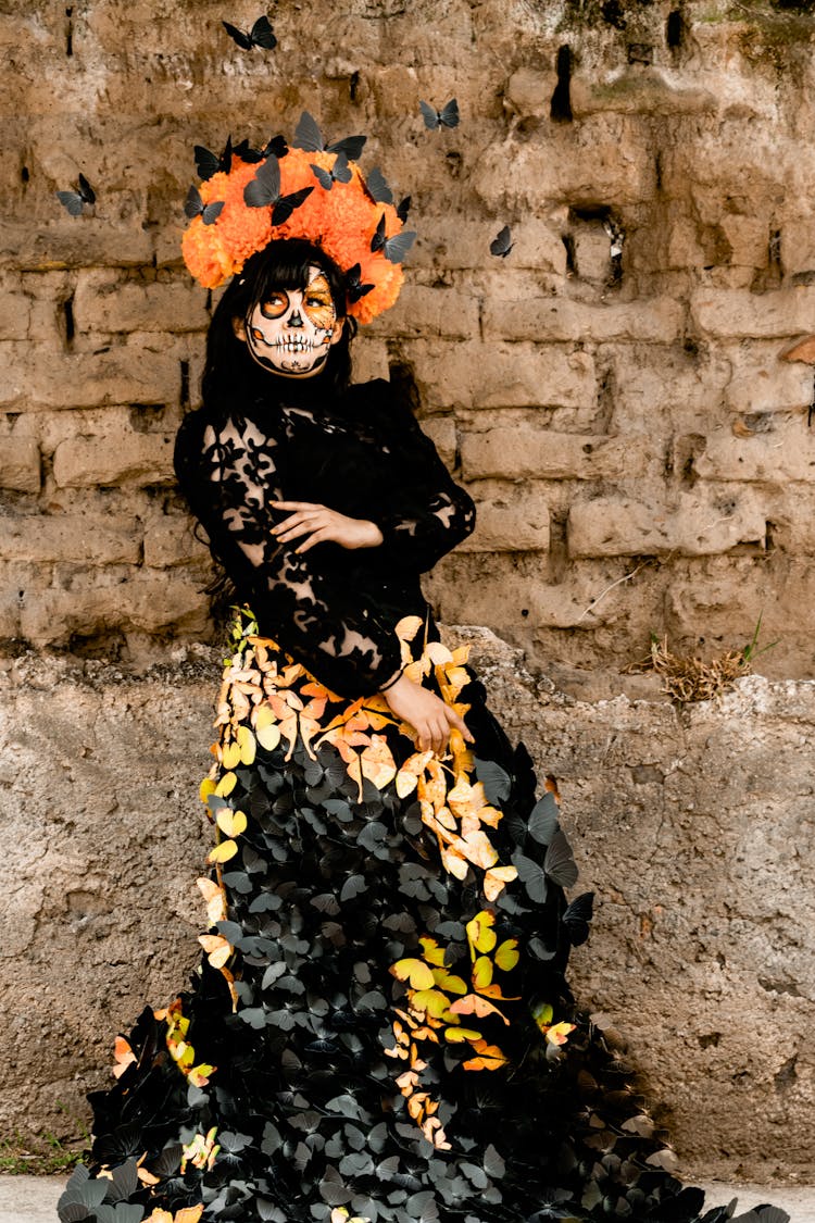 Woman In Dress And Makeup For Day Of The Dead