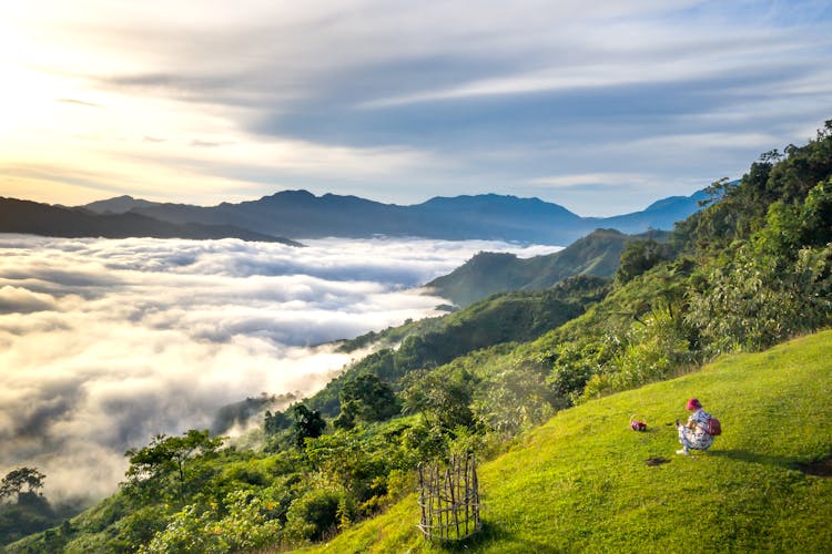 Mountains And Hills Covered By Fog 