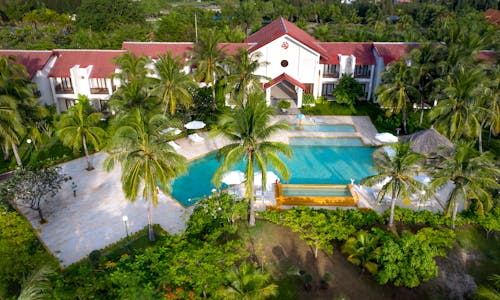 Základová fotografie zdarma na téma hotel, kokosové palmy, letecká fotografie