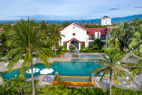 Gratis Foto stok gratis hotel, kelapa, kolam renang Foto Stok