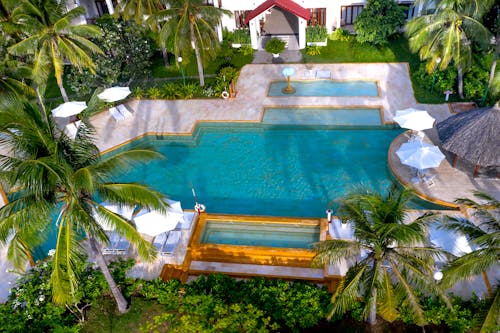 Free Swimming Pool in Luxury Tropical Resort Stock Photo
