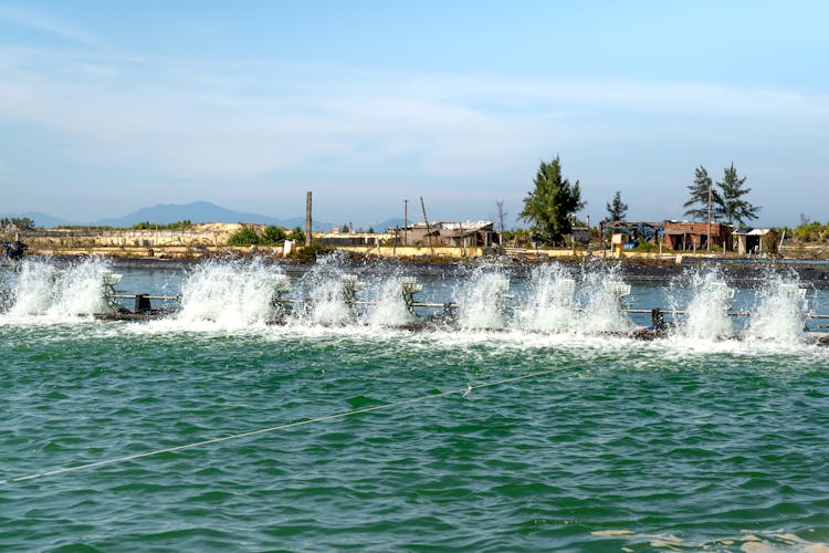 Water Splashing Against A Dam