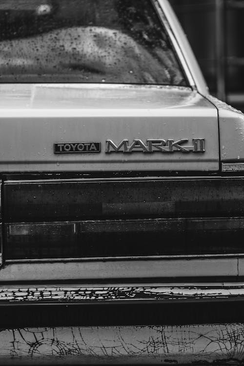 Grayscale Photo of a Toyota Mark II Car