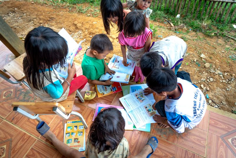 Children reading and learning together