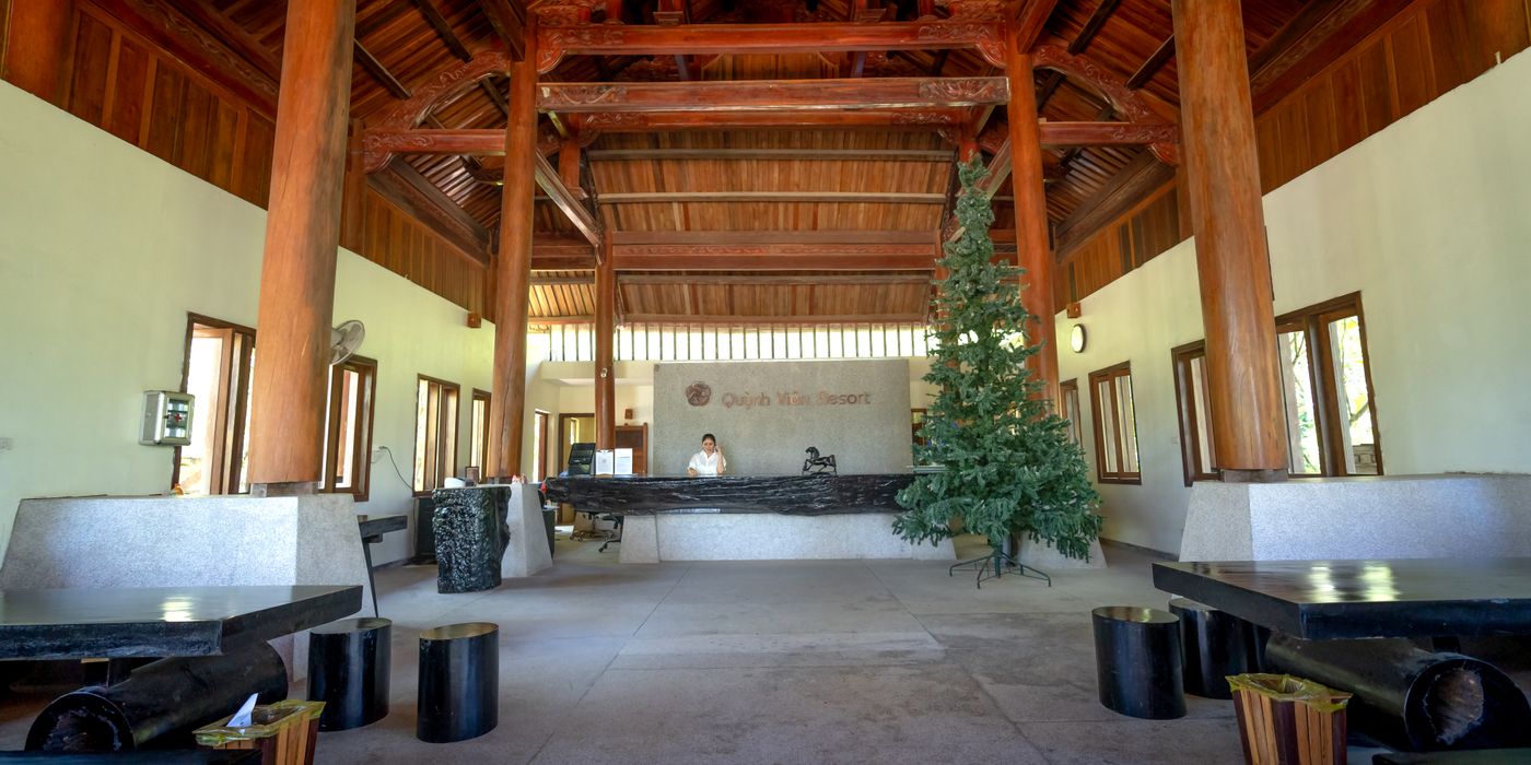 A hotel reception desk where guests check out and review their bill