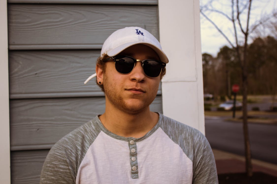 Close-Up Photography of Man Wearing Sunglasses