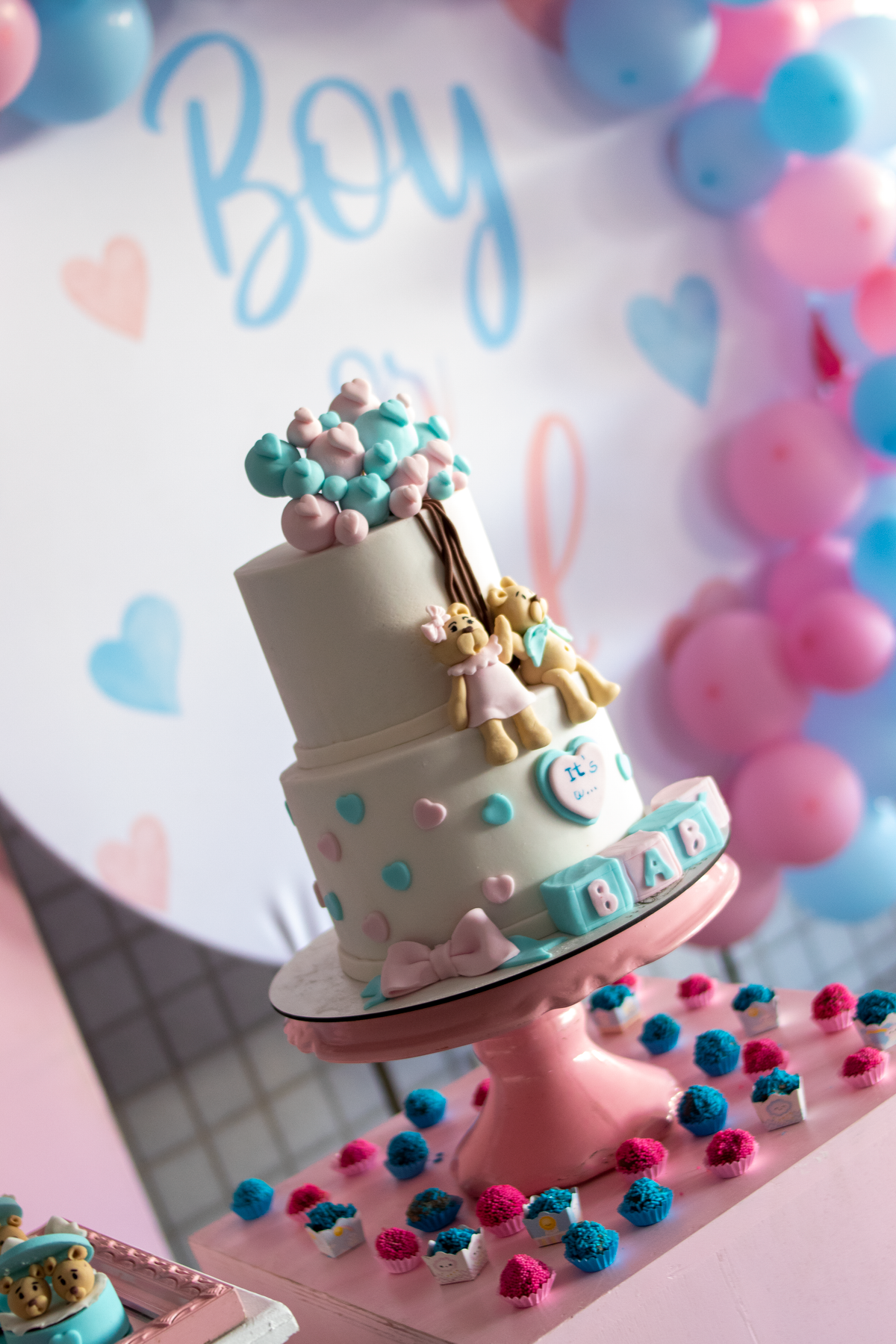 Baby shower cake decorated with baby blocks spelling BABY