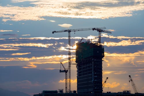 Unfinished Concrete Building With Tower Crane