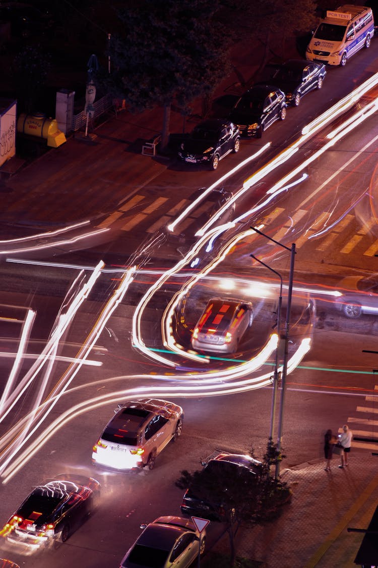 Cars On Road During Night Time