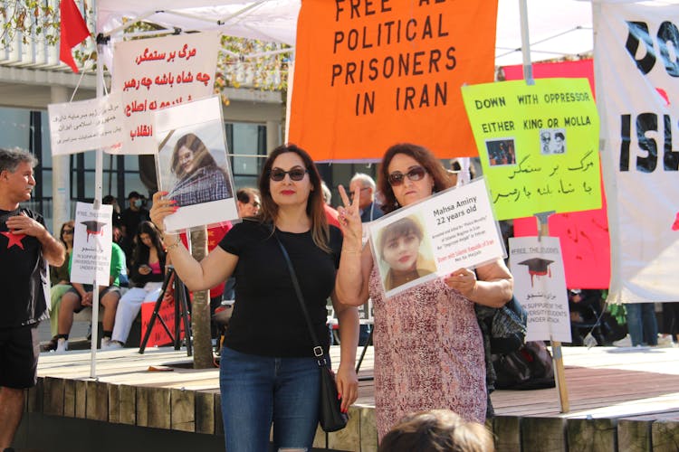 People Holding Banners Protesting