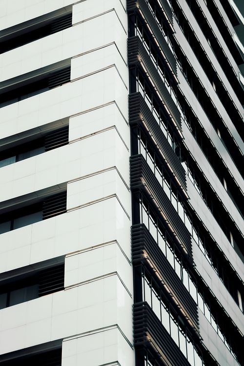 Free Contemporary architecture with sleek lines and glass facade in Mashhad, Iran. Stock Photo