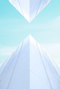 Geometric modern architecture showcasing sharp facades against a clear sky.