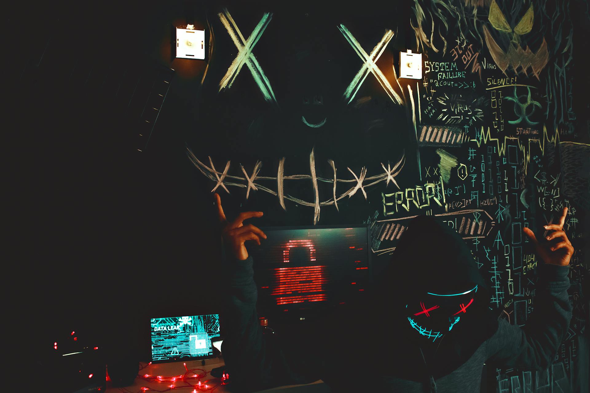 A masked individual in a cyberpunk inspired room filled with graffiti and digital elements.