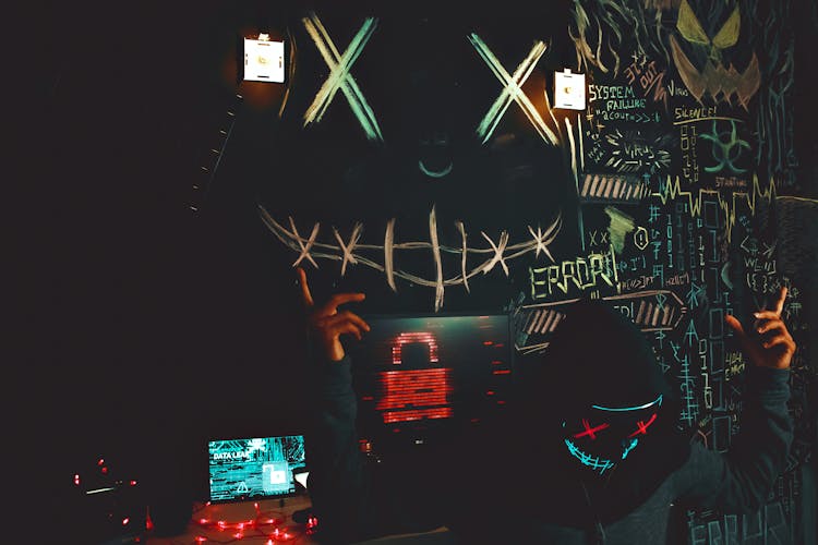 Graffiti Behind A DJ In A Mask