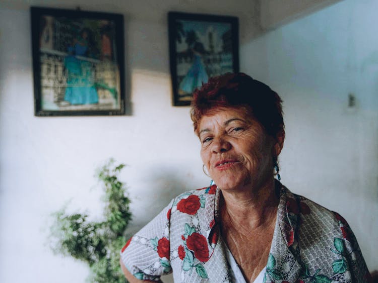 Red Haired Elderly Woman In Shirt