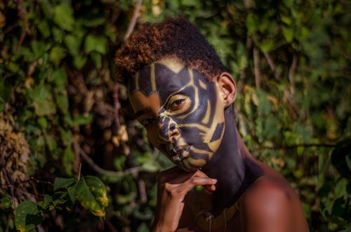 Free Close-Up Photography of Person With Face Paint Stock Photo