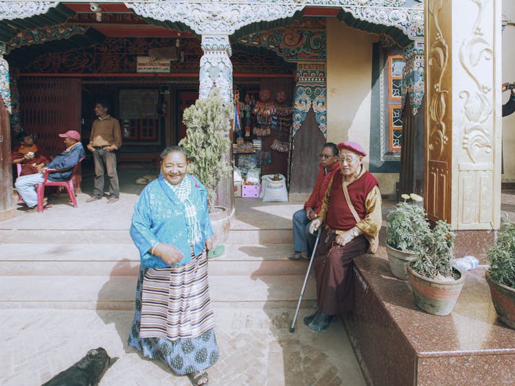 Elderly People Hanging Out In Front Of The Building