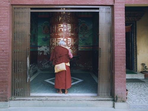 Monk Praying in a Temple 