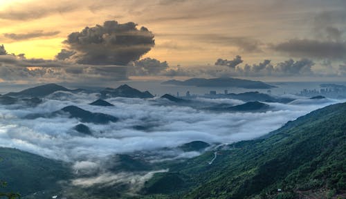 Photo of Mountains Covered with Clouds
