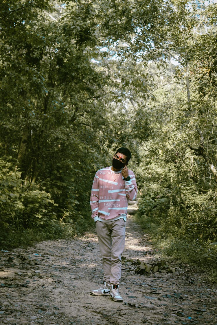 Man Wearing Facemask In The Forest