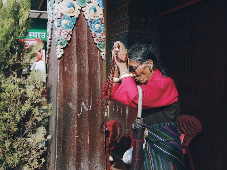 Elderly Woman Praying