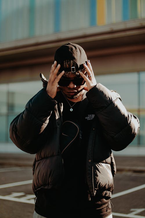 Man in Cap and Black Jacket