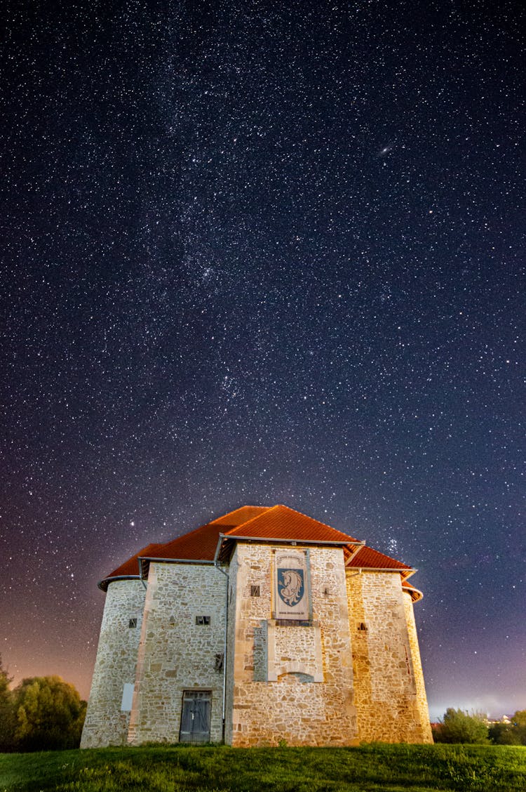 Brick Building Against Starry Night Sky