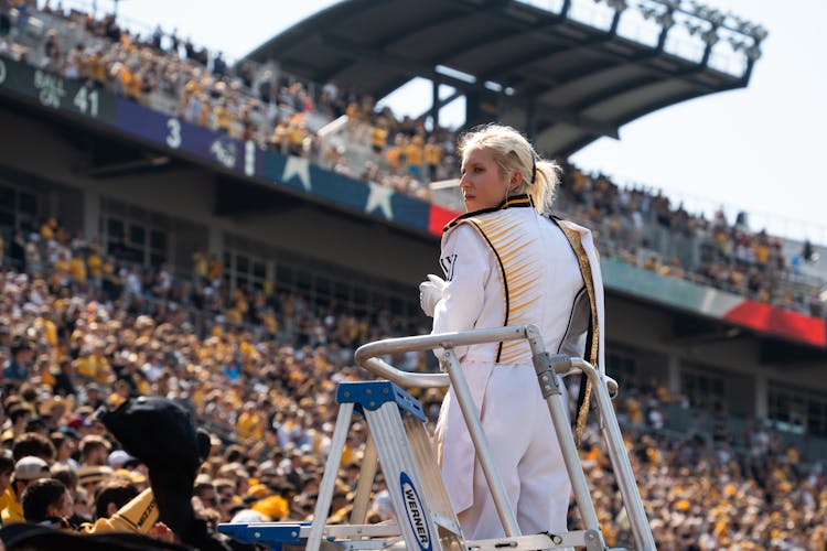 Woman In Uniform On Stadium