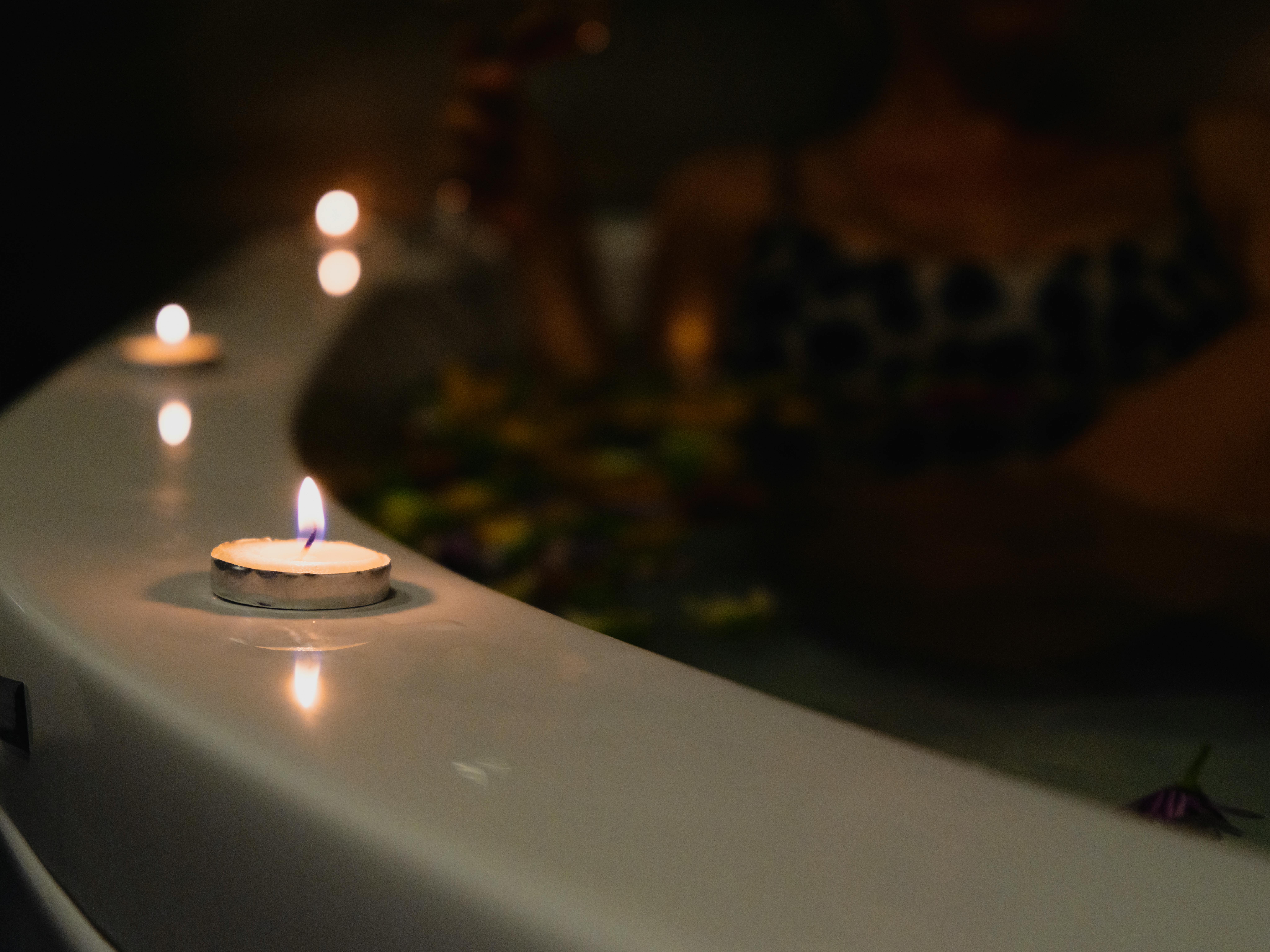Lighted Candle on White Ceramic Jacuzzi · Free Stock Photo