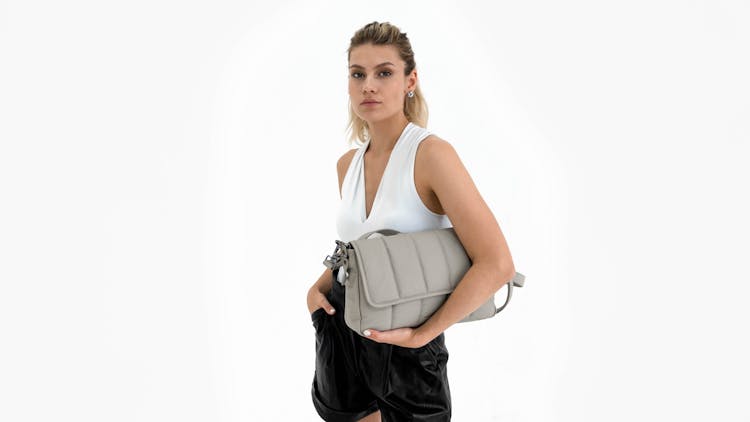 Blonde Woman Holding Bag