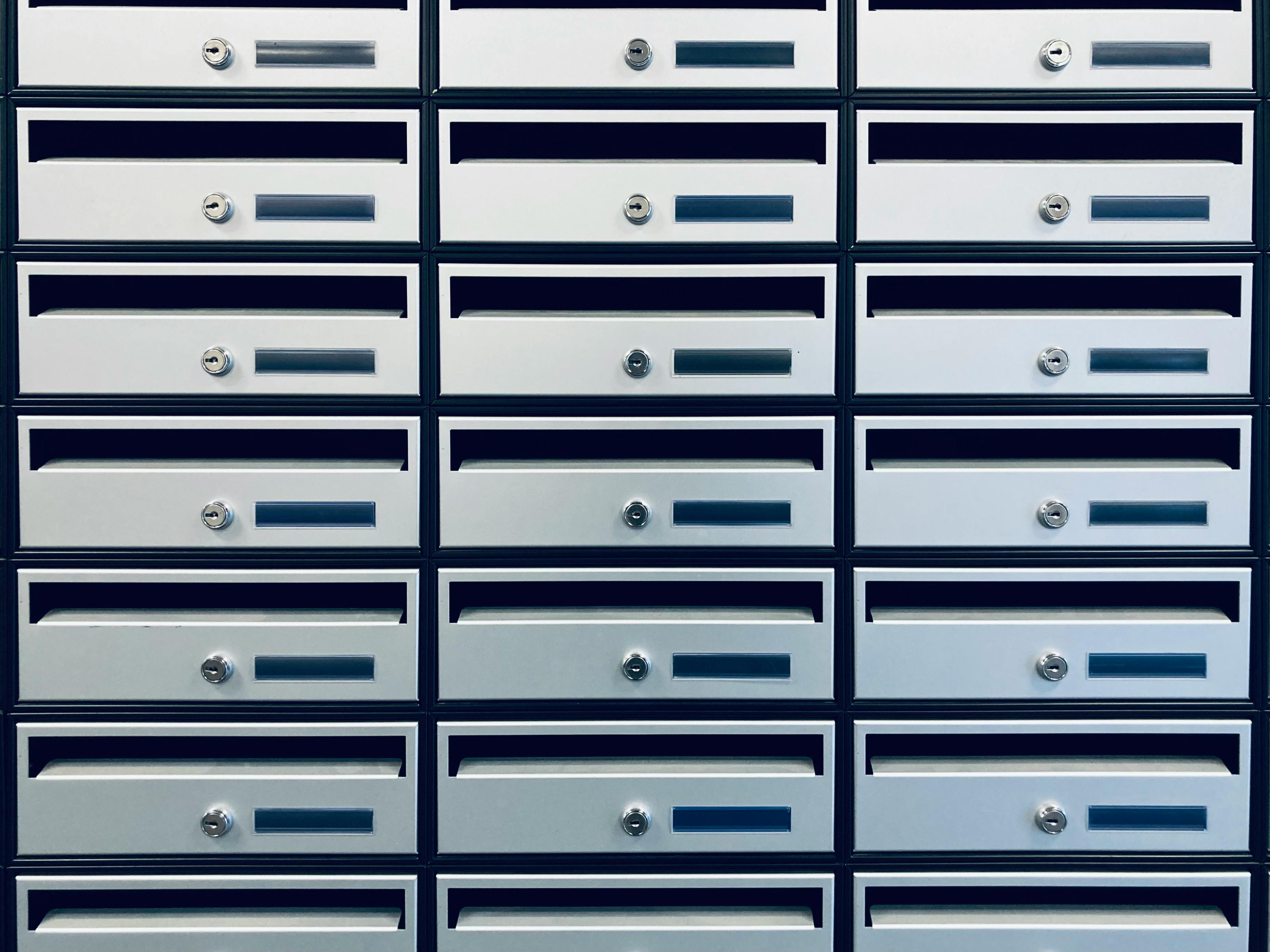 silver mailboxes in rows