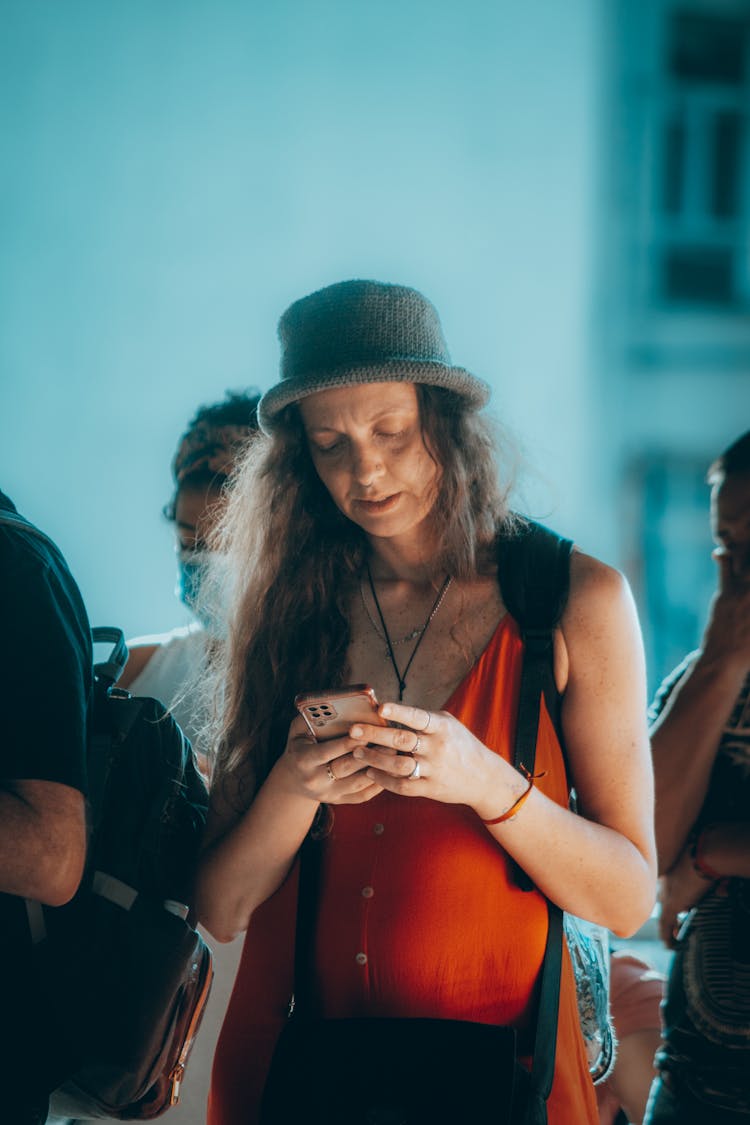 Woman In Hat With Smartphone