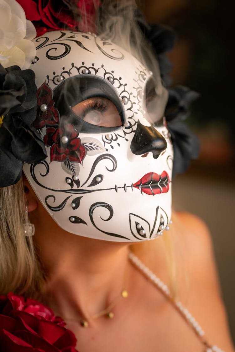 Close-up Of A Woman Wearing A Mask