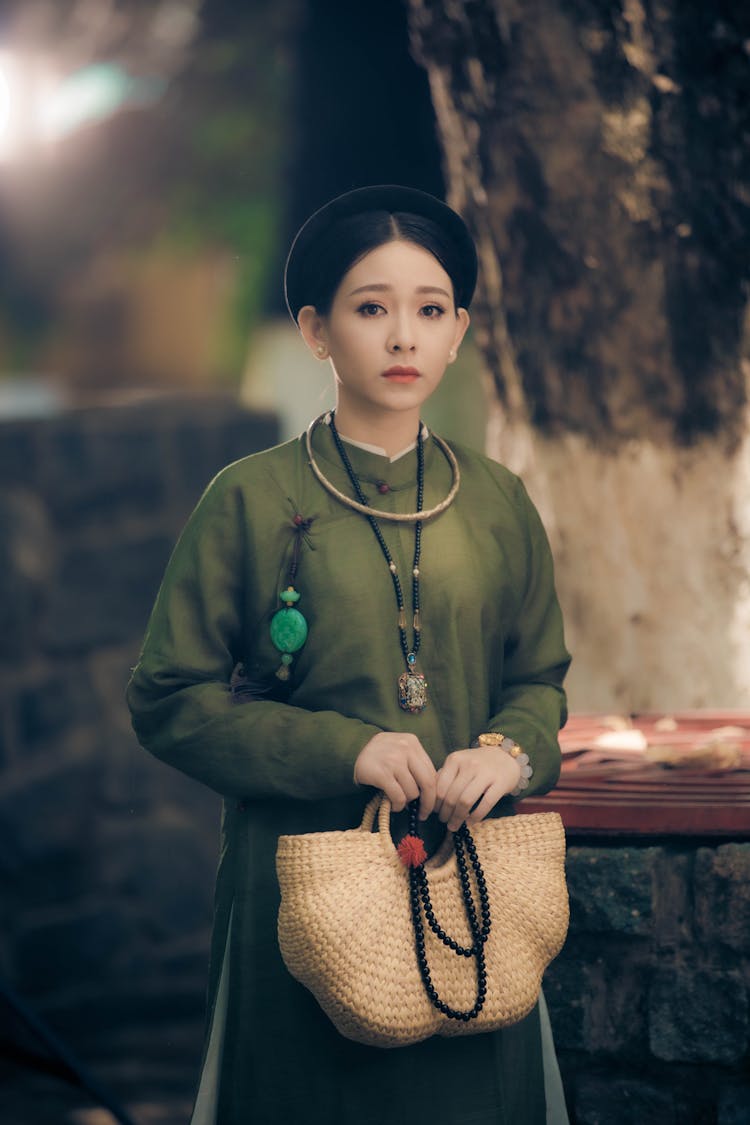 Young Elegant Woman Holding A Bag 