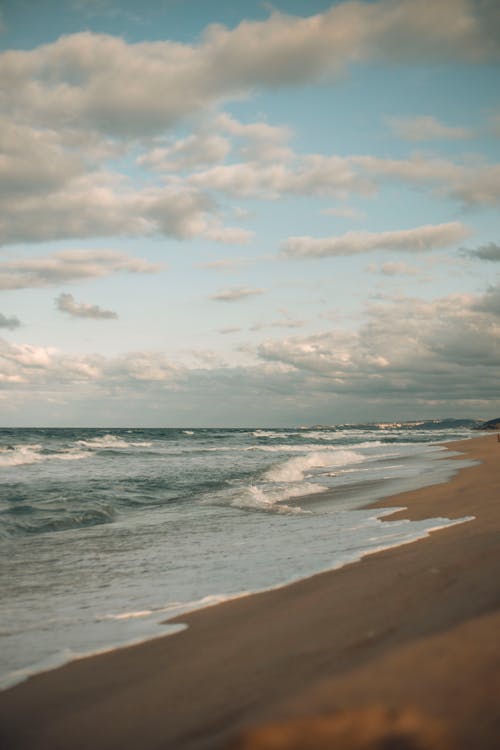Clouds Over a Sandy Beach
