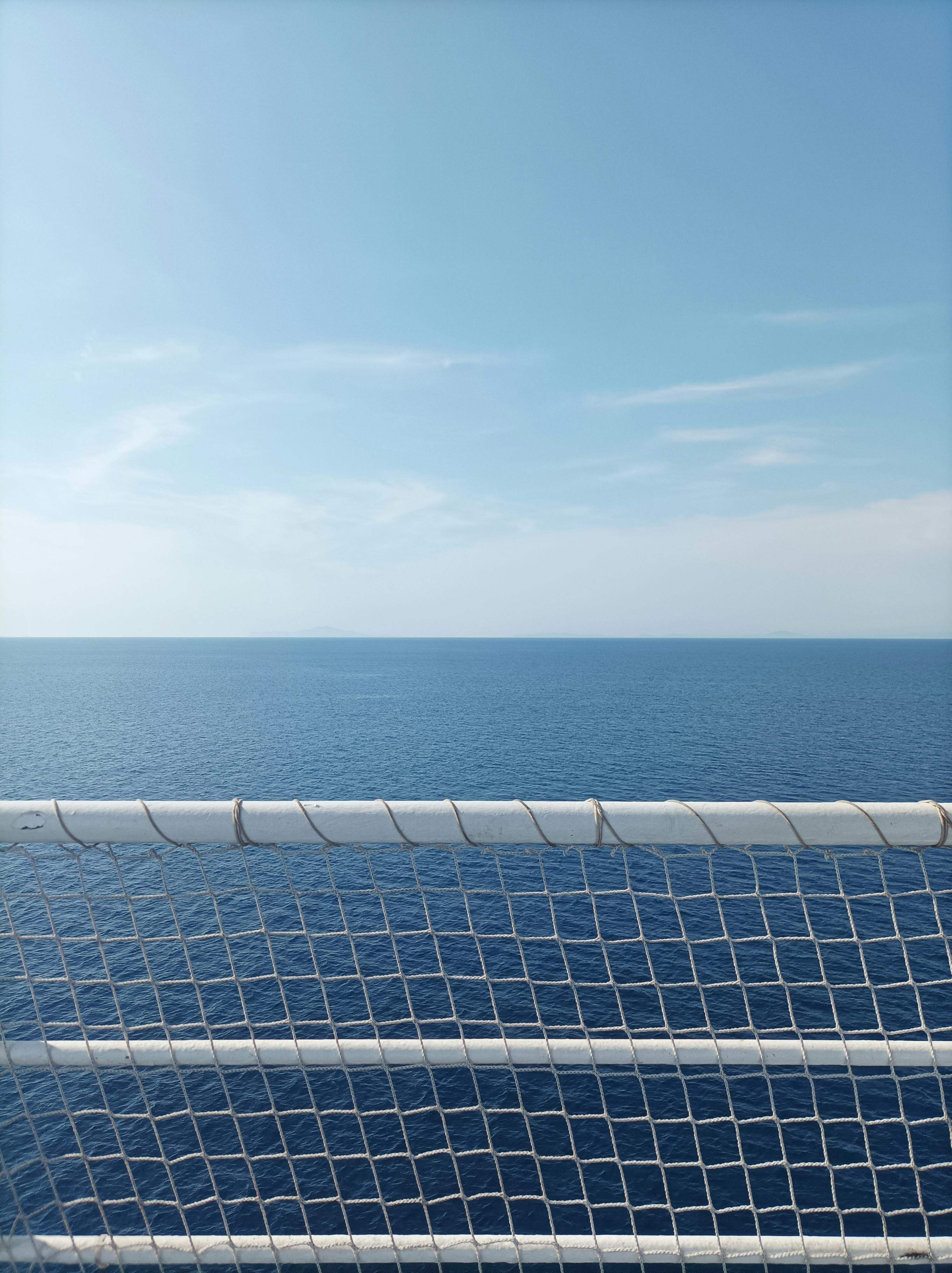 Staircase with Metal Railings on a Building Near the Sea · Free Stock Photo